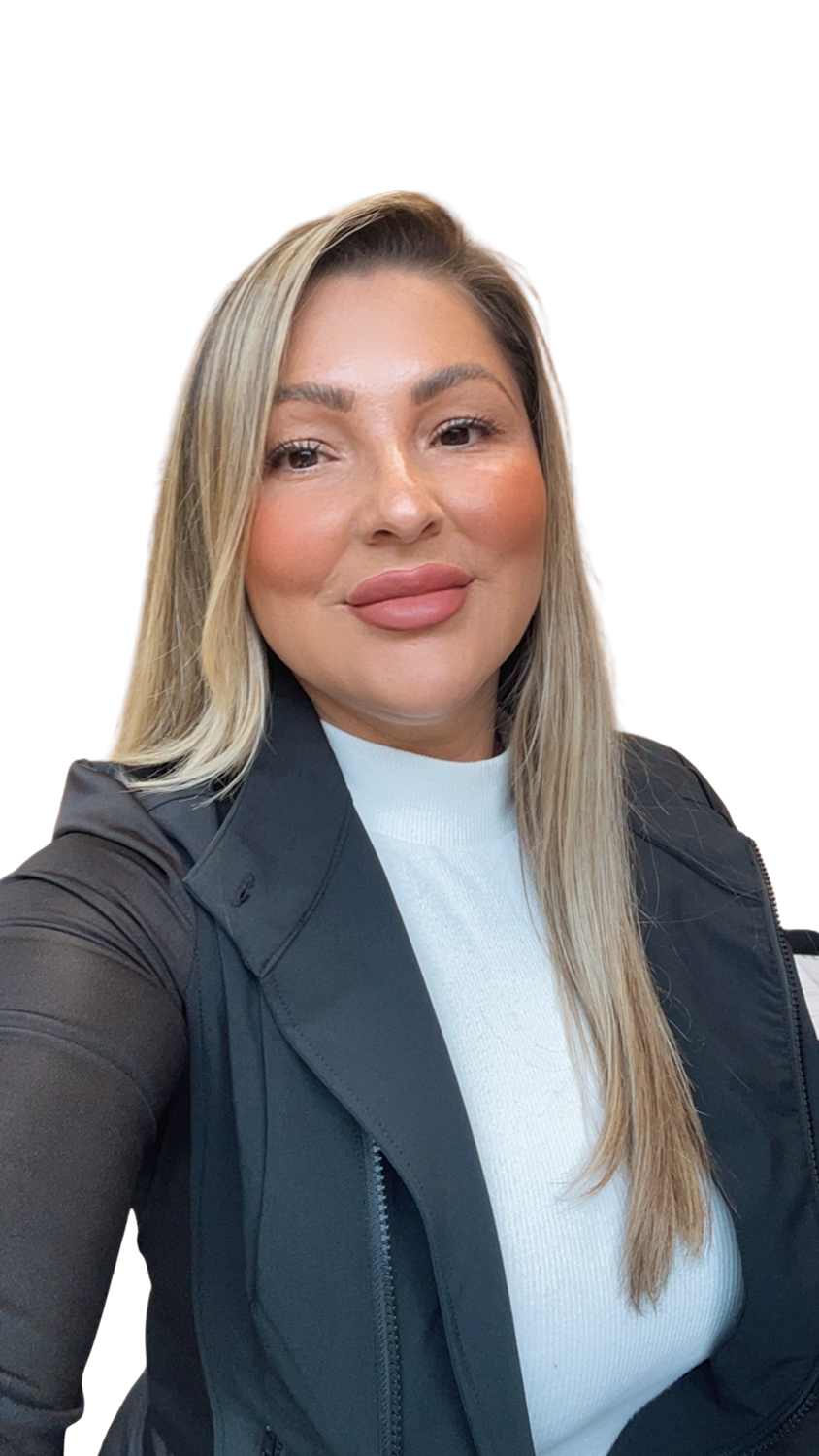 Smiling woman with long brown hair, black jacket.